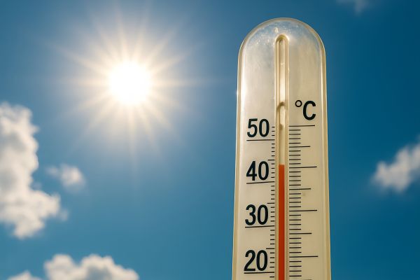 thermometer in front of hot sky
